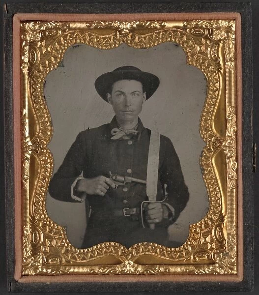 CIVIL WAR: SOLDIER, c1863. Portrait of a Confederate soldier holding a Baby Colt Dragoon revolver
