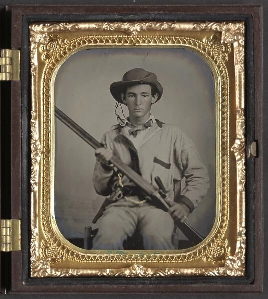 CIVIL WAR: SOLDIER, c1863. Portrait of a Confederate soldier. Tintype, c1863