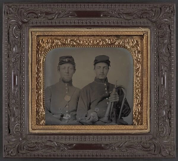 CIVIL WAR: SOLDIERS, c1863. Portrait of a Union soldiers, one holding a bugle. Ambrotype