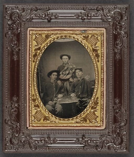 CIVIL WAR: SOLDIERS, c1863. Portrait of three Union soldiers. Tintype, c1863