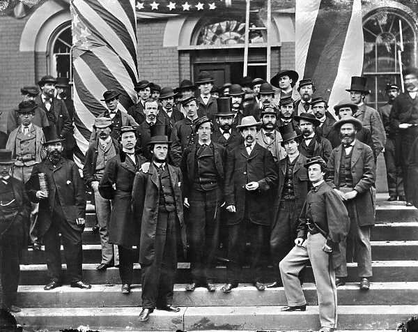 CIVIL WAR: WAR DEPARTMENT. Group of War Department employees photographed outside the War Department building in Washington, D. C. 1865