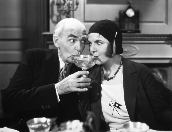 Claude Gillingwater and Winnie Lightner in a scene from the film
