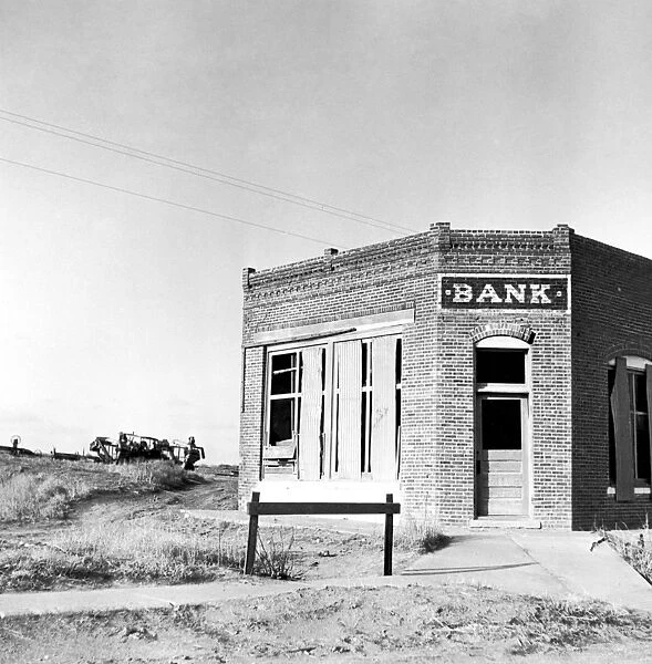 CLOSED BANK, 1936. A closed Kansas bank in rural America. Photographed by Arthur Rothstien, 1936