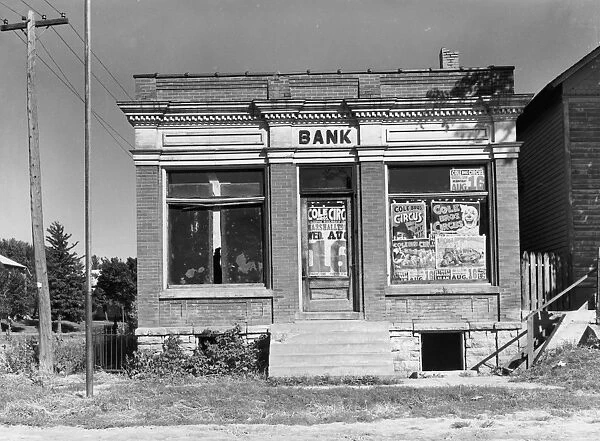 CLOSED BANK, 1939. A closed bank at Haverill, Iowa. Photograph by Arthur Rothstein