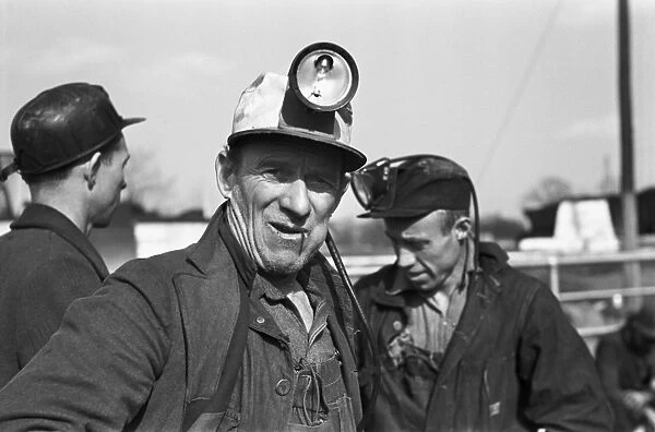 COAL MINERS, 1937. Three coal miners in Birmingham, Alabama. Photograph by Arthur Rothstein