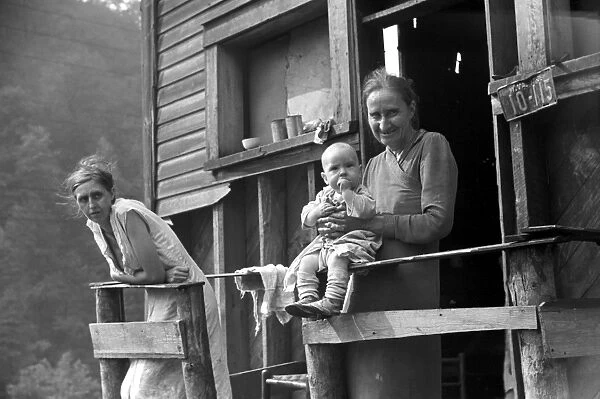 COAL MINERs FAMILY, 1938. Mother, wife and baby of unemployed coal miner, Marine, West Virginia