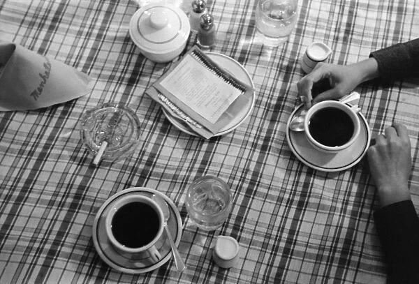 COFFEE, 1939. After dinner coffee in Lufkin, Texas. Photograph by Russell Lee, 1939