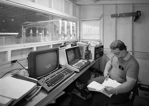 COMPUTER ROOM, 1986. An electronics engineer at the data collection computer room