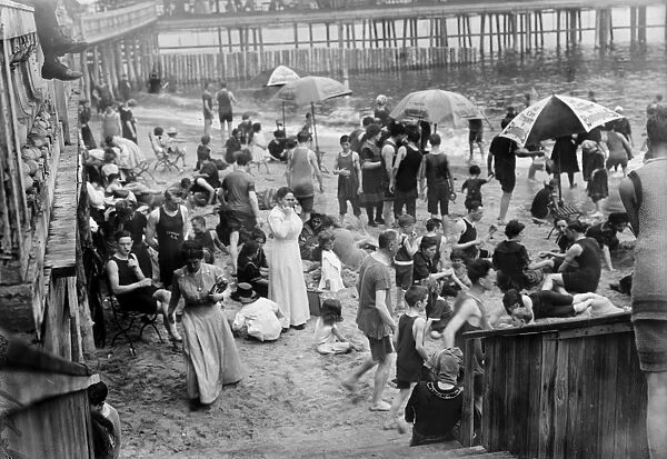 CONEY ISLAND: BEACH. People on the beach at Coney Island, Brooklyn, New York. Early 20th century photograph