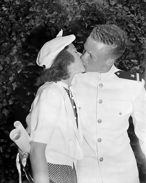 CONGRATULATIONS KISS, 1939. Walter B. Miller receiving a kiss from his girlfriend
