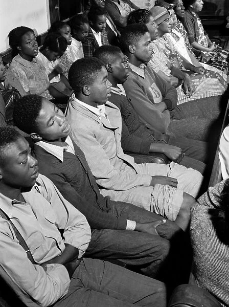CONGREGATION, 1941. African Americans singing in a church in Union Point, Georgia