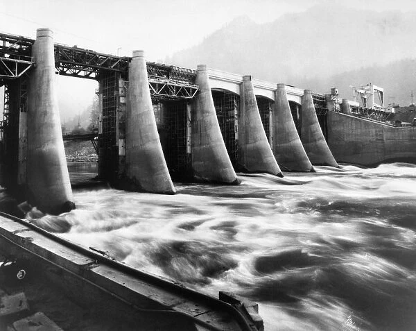 Construction of the Bonneville hydroelectric dam, erected by the U. S. Corps of Engineers, on the Columbia River between Washington and Oregon. Photograph, 10 November 1936