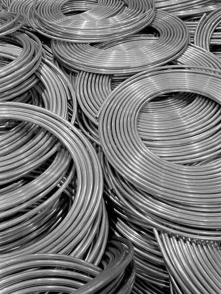 COPPER TUBING, c1942. Coils of copper tubing at the Chase Copper and Brass Company in Euclid