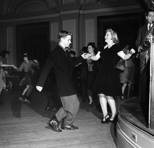 Couples dancing the Jitterbug at and Elks Club dance in Washington, D. C. Photograph by Esther Bubley, April 1943