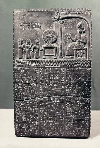 CUNEIFORM. Babylonian stone tablet of King Nabu-apla-iddina and seated sun-god Samas. From sippar, c870 B. C
