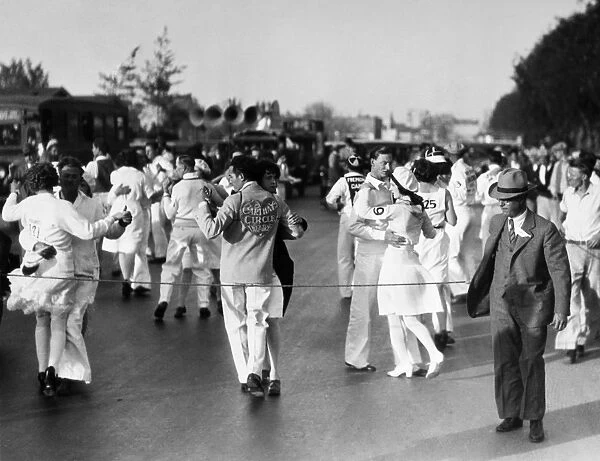 DANCE MARATHON, 1928. Couples dancing in a marathon dance contest in Culver City