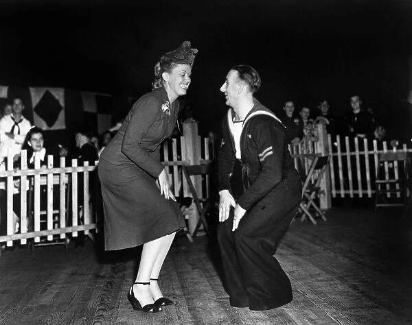 Dancers George Binstead and Sheila Tate dancing the Lambeth Walk, c1940