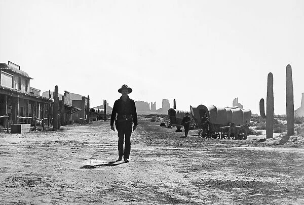 MY DARLING CLEMENTINE. Henry Fonda as Wyatt Earp, walking to the gunfight at the O. K. Corral, 1946