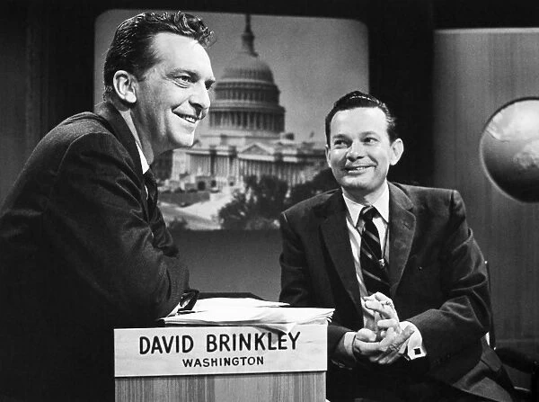 DAVID BRINKLEY (1920-2003). American news commentator. Photographed, right, in 1958 with Robert Chester Chet Huntley (1911-1975)