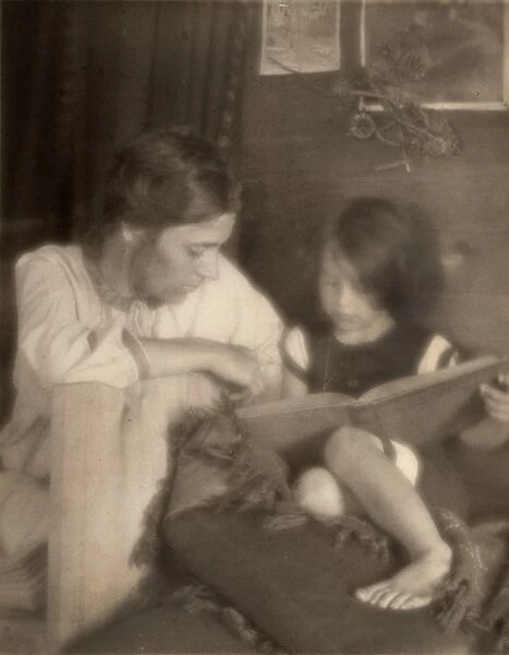 DAY: MOTHER AND CHILD, c1909. Beatrice Baxter Ruyl reading to her daughter Ruth