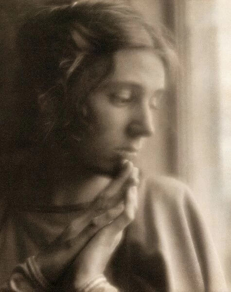 DAY: WOMAN, 1905. Portrait of Beatrice Baxter Ruyl wearing a cloak. Photograph by F