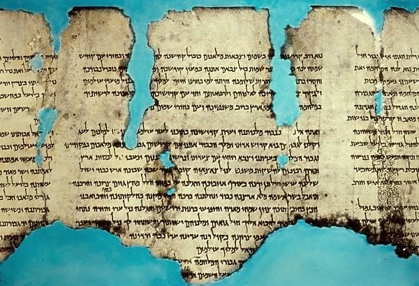 DEAD SEA SCROLLS. Detail of a section of a Dead Sea scroll, from The War of the