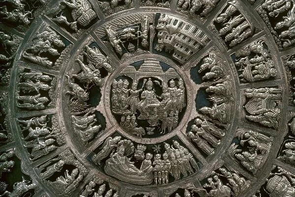 Detail of a decorative silver plate from India, with various scenes from Hindu or Buddhist mythology