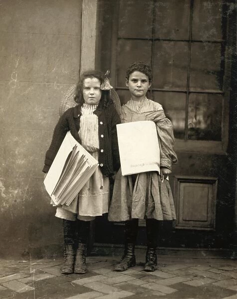 DELAWARE: NEWSGIRLS, 1910. Girls selling papers at Wilmington, Delaware. Photograph by Lewis Hine