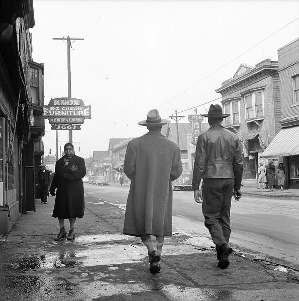 DETROIT, 1942. A man wearing a zoot suit in the business district of Detroit, Michigan