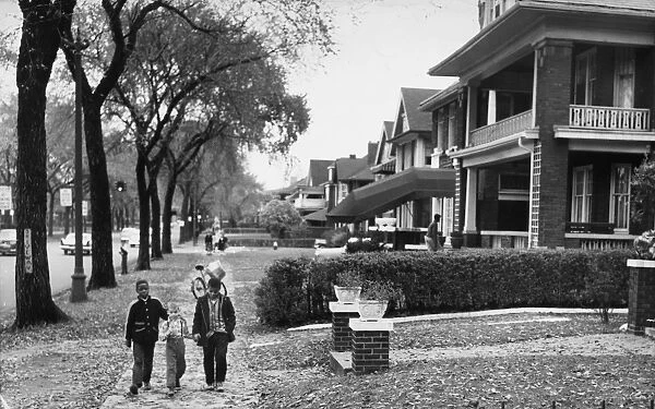 Dexter Avenue in a middle class neighborhood in Detroit, Michigan, previously all white, now, in 1957, integrated