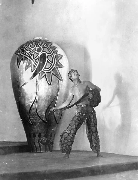DOUGLAS FAIRBANKS (1883-1939). American cinemactor. In a scene from The Thief of Baghdad, 1924