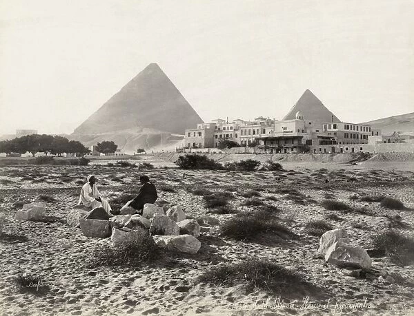 EGYPT: GIZA HOTEL. The Mena House Hotel at Giza, Egypt, with the Great Pyramids in the background. Photograph, late 19th century