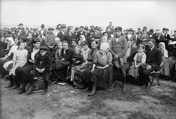 ELLIS ISLAND, c1900. Immigrants on Ellis Island waiting for a boat