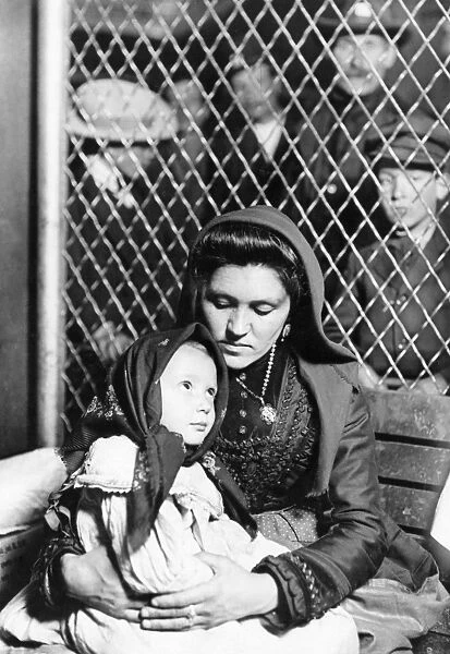 ELLIS ISLAND: IMMIGRANTS, 1905. An Italian mother and child; photographed by Lewis W