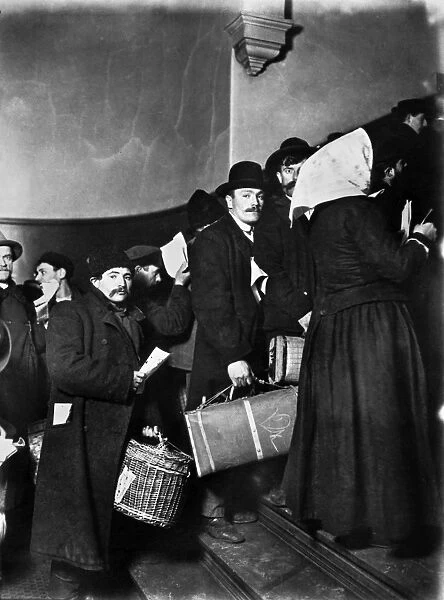 ELLIS ISLAND: IMMIGRANTS. A group of Slavic immigrants waiting to enter Ellis Island