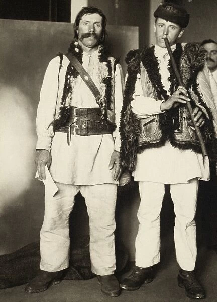 ELLIS ISLAND: MEN, c1910. Portrait of Romanian pipers at Ellis Island