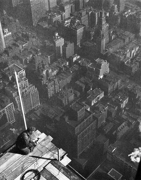 EMPIRE STATE BUILDING, 1931. Steel worker at the Empire State Building, New York City