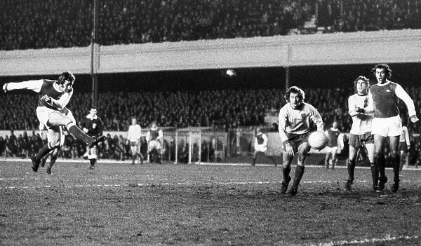 ENGLAND: SOCCER GAME, 1972. Alan Ball of Arsenal FC scores a goal against Norwich City FC, 26 December 1972