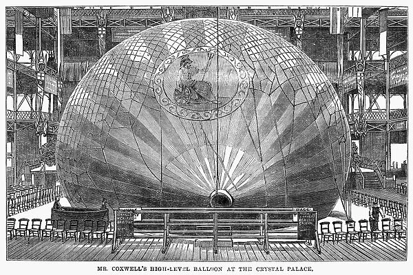English aeronaut, Henry Tracey Coxwells high-level balloon on display at the Crystal Palace in London. 1864 engraving