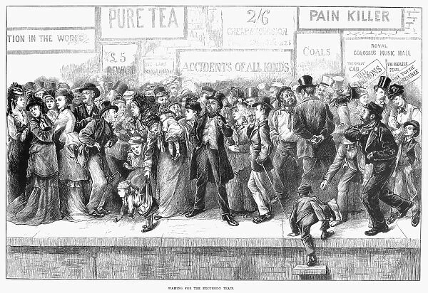 EXCURSION TRAIN, 1880. Londoners waiting for the excursion train to leave the city on a Bank Holiday. Line engraving, English, 1880