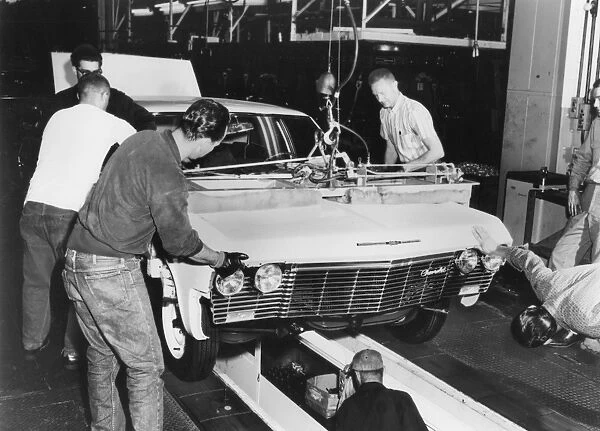 FACTORY: CHEVROLET, 1960s. A Chevrolet assembley line in the early 1960s