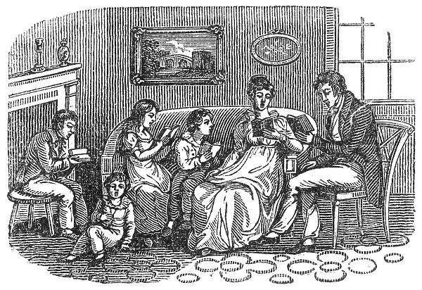 FAMILY: READING, 1800. A family reading together: wood engraving, American, c1800
