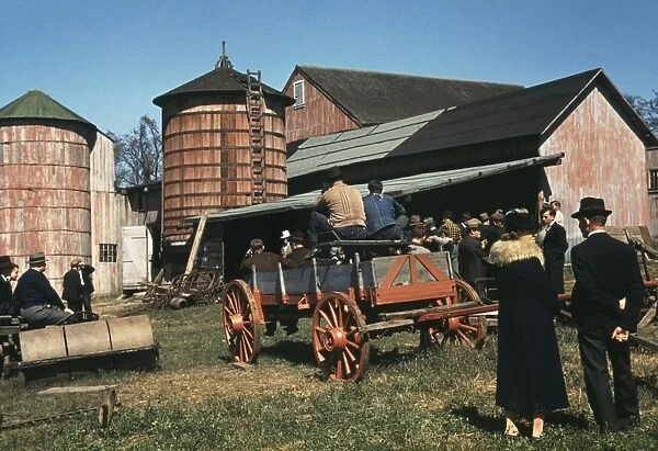 FARM AUCTION, 1940. Farmers at a farm auction in Derby, Connecticut. Photograph by Jack Delano, September 1940