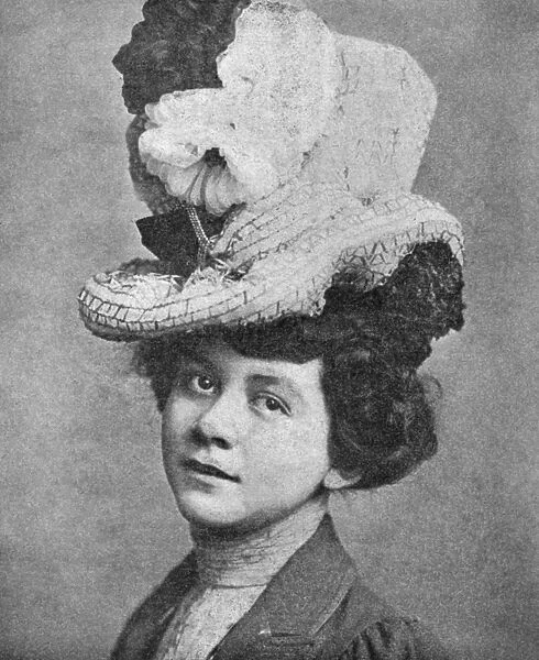 FASHION: HAT, 1900. A ladies walking hat of straw and chiffon with mousseline flowers