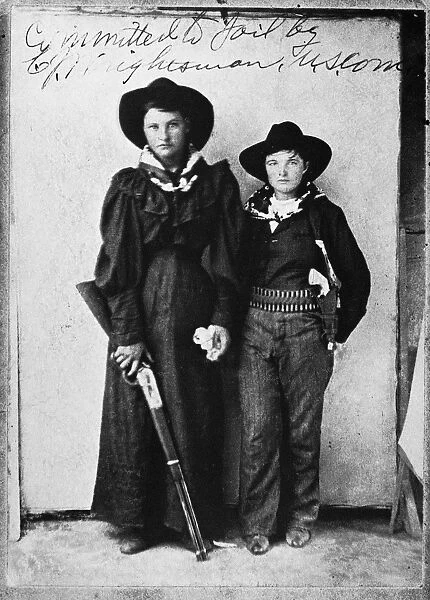 FEMALE OUTLAWS. Cattle Annie and Little Britches, teenage members of the Doolin gang. Late-19th century photograph