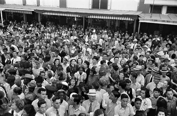 FESTIVAL CROWD, 1938. A crowd waiting for the Cajun band contest to begin during