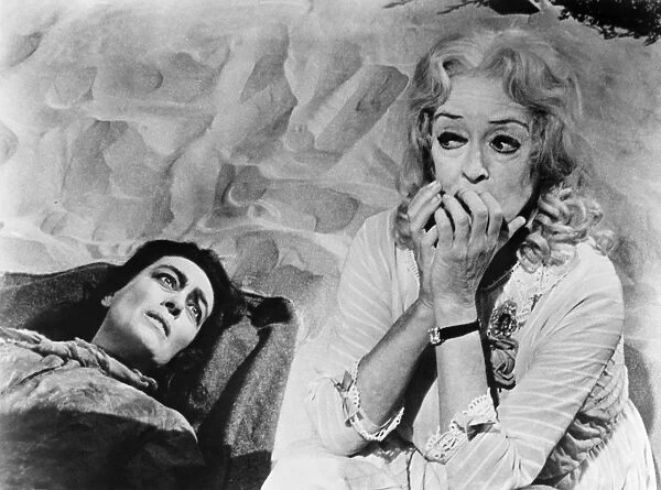 FILM: BABY JANE, 1962. Joan Crawford, left, and Bette Davis as sisters in What Ever Happened to Baby Jane? directed by Robert Aldrich, 1962