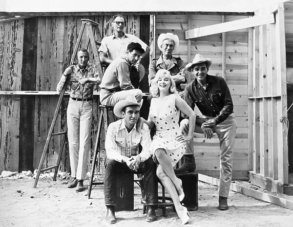 FILM: THE MISFITS, 1961. Clockwise from top: Arthur Miller, Eli Wallach, John Huston, Montgomery Clift, Marilyn Monroe and Clark Gable. Photographed on location while filming The Misfits, 1961
