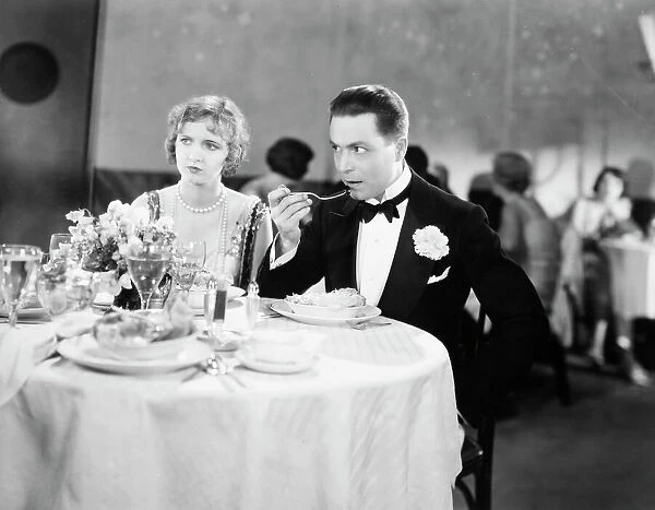 FILM STILL: FORD & POWERS. Harrison Ford and Lucille Powers in a scene from a silent film