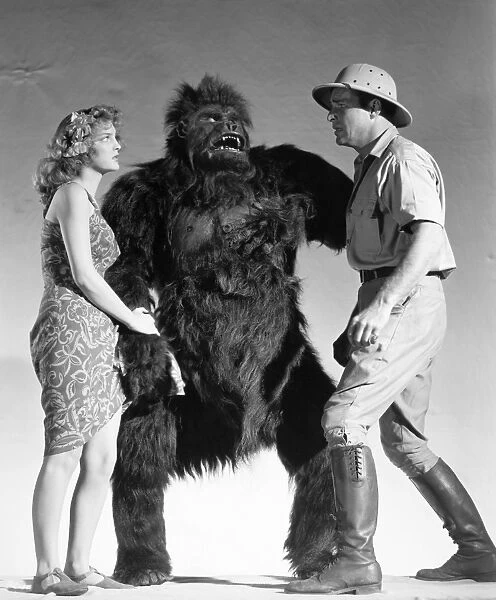 FILM STILL: NABONGA, 1944. From left to right: Julie London, Nabonga and Buster Crabbe